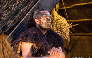 maori tourism, a maori warrior participates in a tourism event in Aotearoa New Zealand